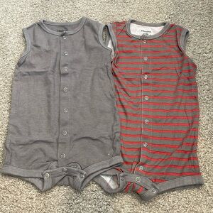 Set of 2 hanes rompers. Barely worn. No rips or stains.